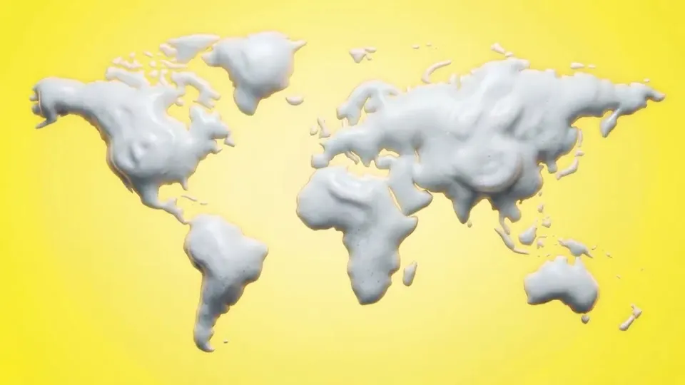 Mapa del mundo hecho de espuma blanca sobre fondo amarillo, del anuncio de Garnier
